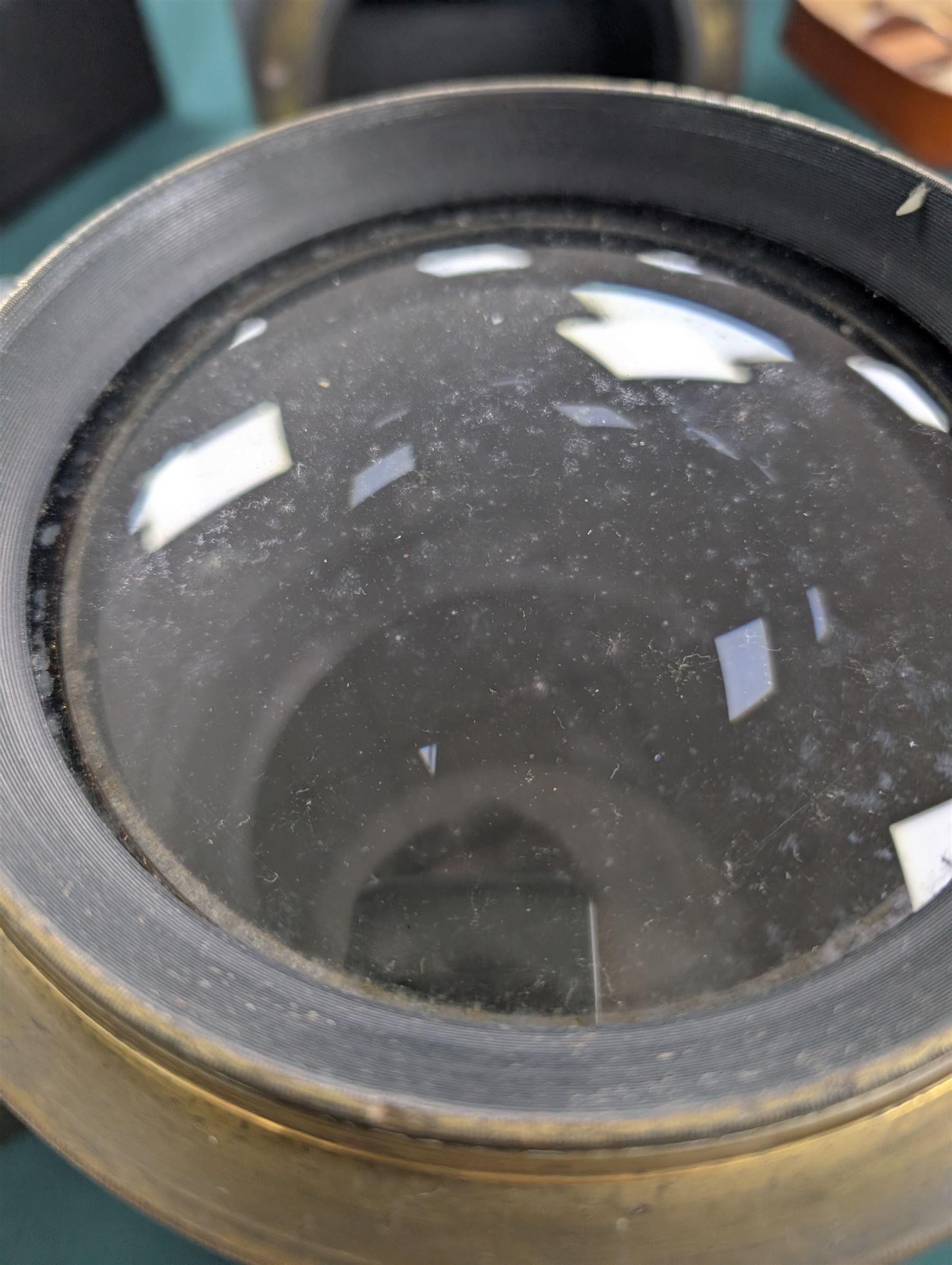 Late 19th century Voigtlander & Sohn large brass Euryscop lens no. 8 serial no. 31590, mounted to long black wooden box, with leather lens cover and seven brass Waterhouse stops, lens case D19cm