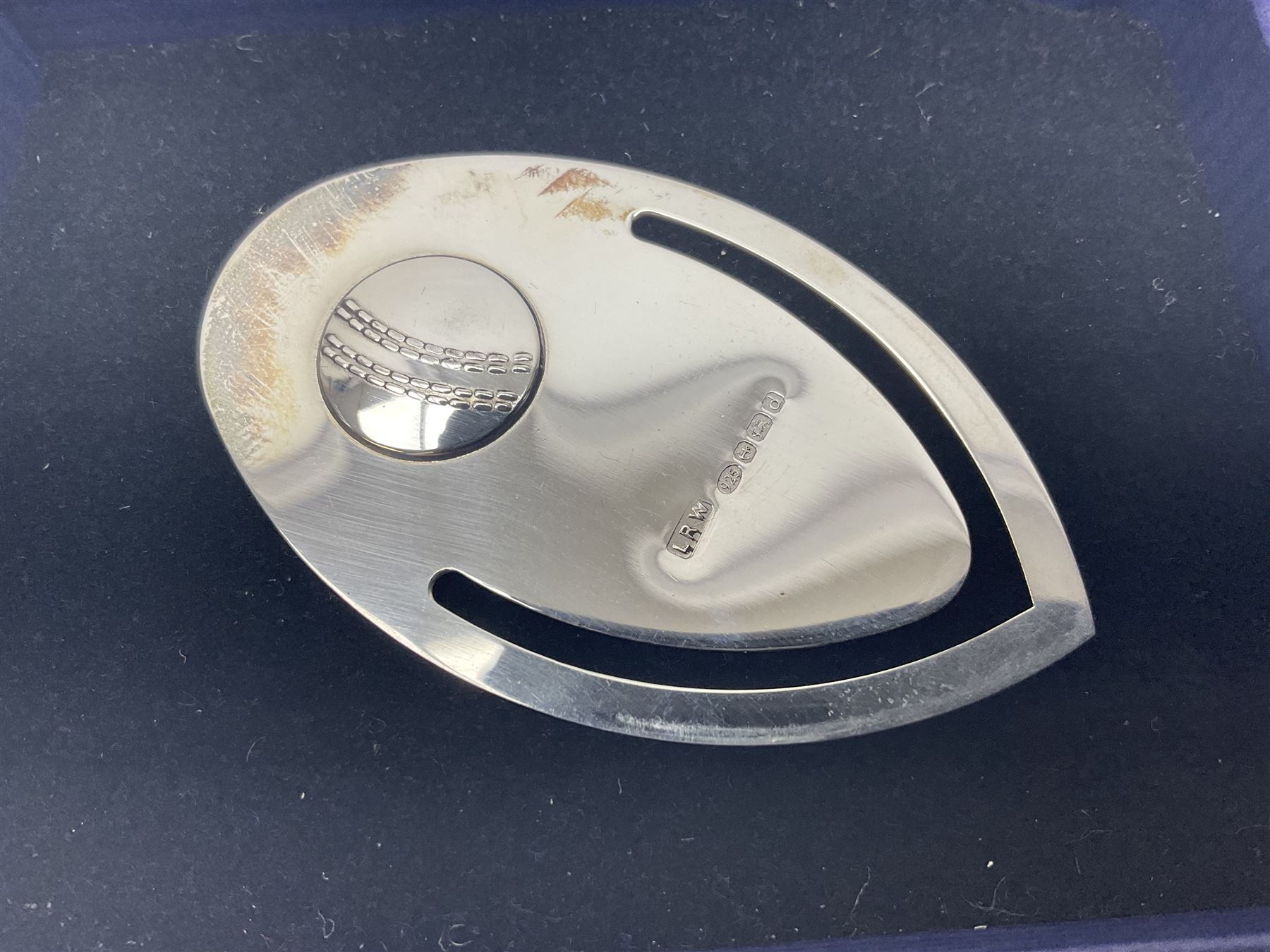Modern silver bookmark, embossed with cricket ball, hallmarked Laurence R Watson & Co, Birmingham 2003, H6cm, boxed 