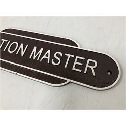 Cast iron Station Master wall plaque on a brown ground, L39cm