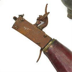 The remains of an 18th century air rifle, possibly German comprising red morocco covered butt and lock, pump with reservoir and spare reservoir 
Provenance: property of a Nobleman