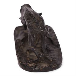 After R J Mene, bronze modelled as a dog with a bone, H5cm, L10cm 
