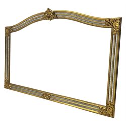 Deknudt Mirrors - Belgian gilt cushion framed wall mirror, arched top with central stylised fleur-de-lis decoration and cartouche corners