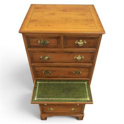 Georgian design yew wood pedestal chest, fitted with seven drawers and slide, brass drop handles