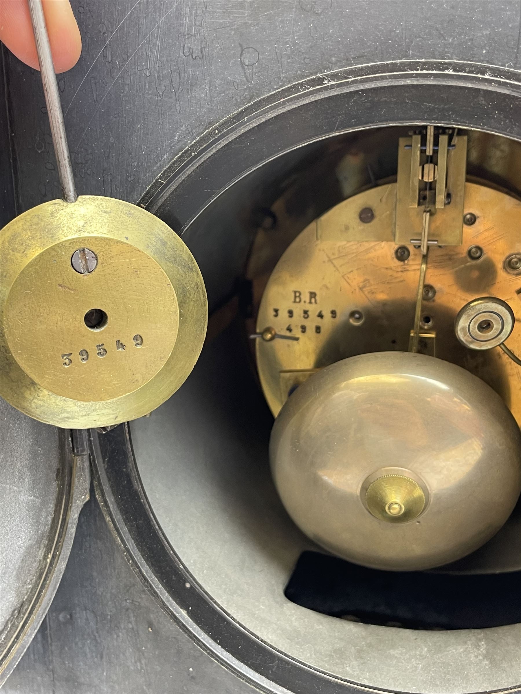 Victorian black slate cased mantel clock, with rouge marble, engraved and gilt decoration, circular dial with Roman chapter ring, twin train eight day movement with brocot escapement, striking the hours and halves on bell, the movement back plate stamped 'B.R 39549 498'