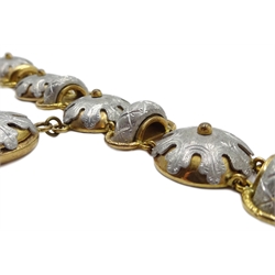 Victorian gilt and aluminium bracelet with drop, each dome gilt link, overlaid with aluminium motifs, the clasp stamped D*V

[image code: 3mc]