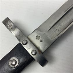 Austrian Model 1895 Carbine knife bayonet with 24.5cm fullered steel blade; various marks to the ricasso including F.G. GY.; cross-piece marked No.7843; in steel scabbard L37cm overall