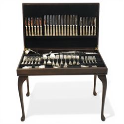 Canteen on stand containing a twelve-place set of King's pattern silver plated cutlery