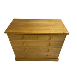 Craftsman made light oak chest, fitted with two short and three long drawers, on plinth base