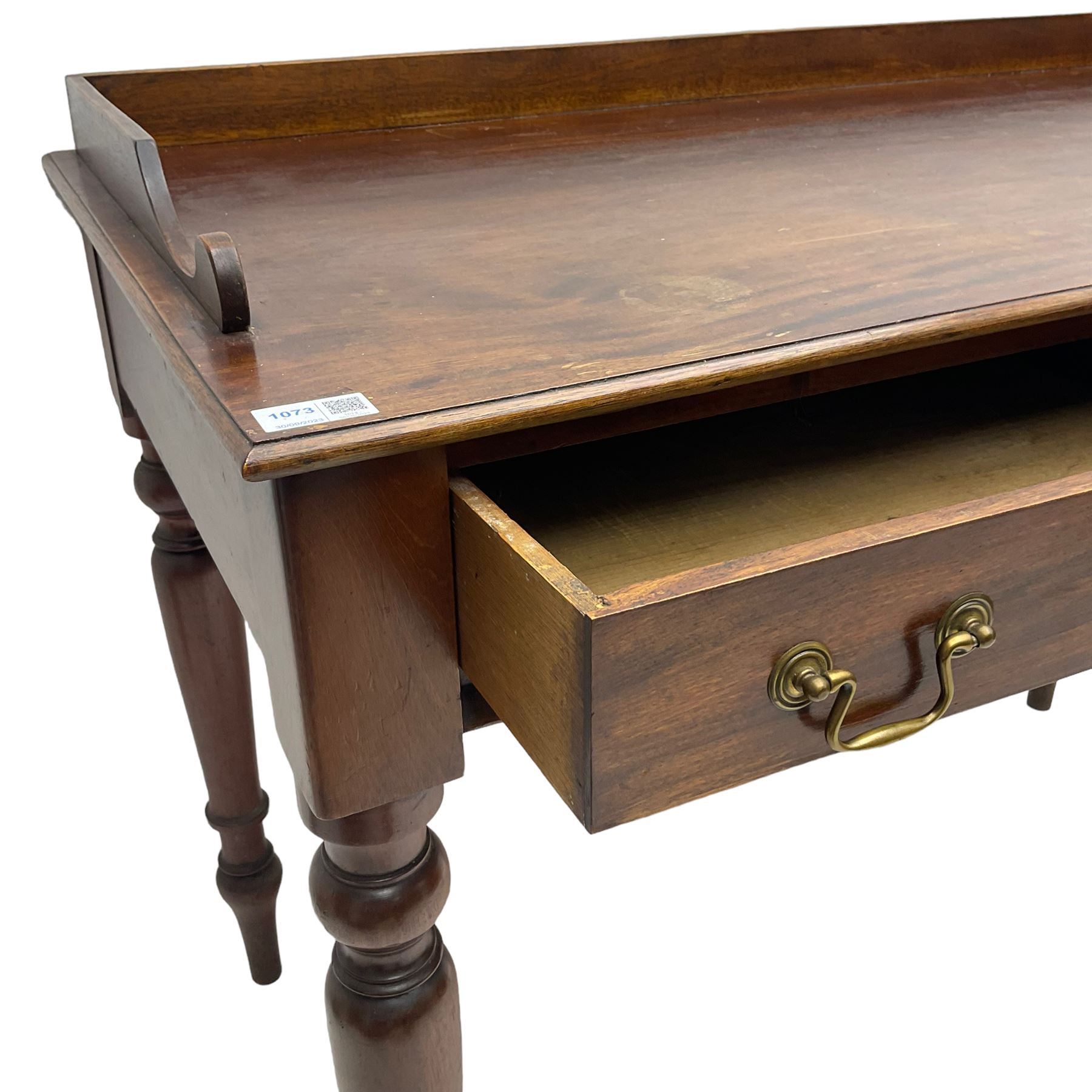 Victorian design mahogany washstand, raised back over rectangular moulded top, fitted with two drawers, on turned supports
