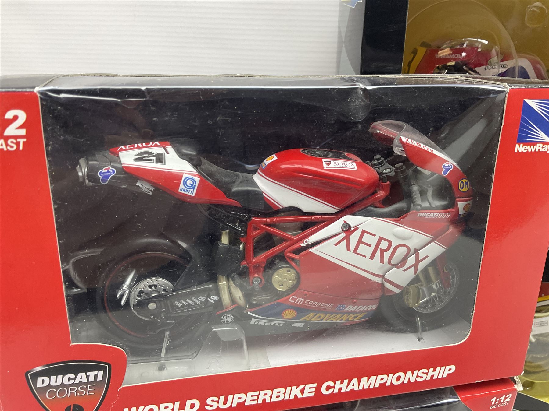 Nine NewRay 1:12 scale die-cast models of motorcycles including Ducati, Honda etc; and four other 1:12 scale die-cast models of motorcycles; all boxed (13)