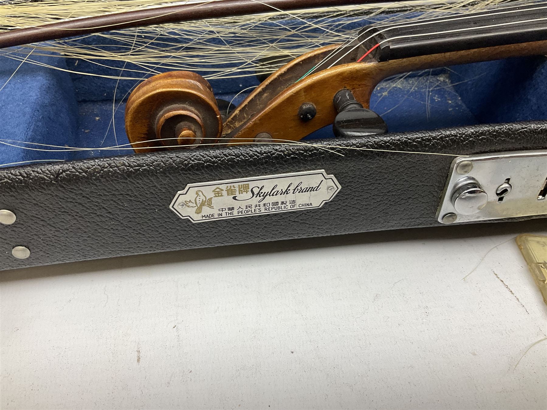 Two cased Skylark violins with bows, largest violin L59cm 