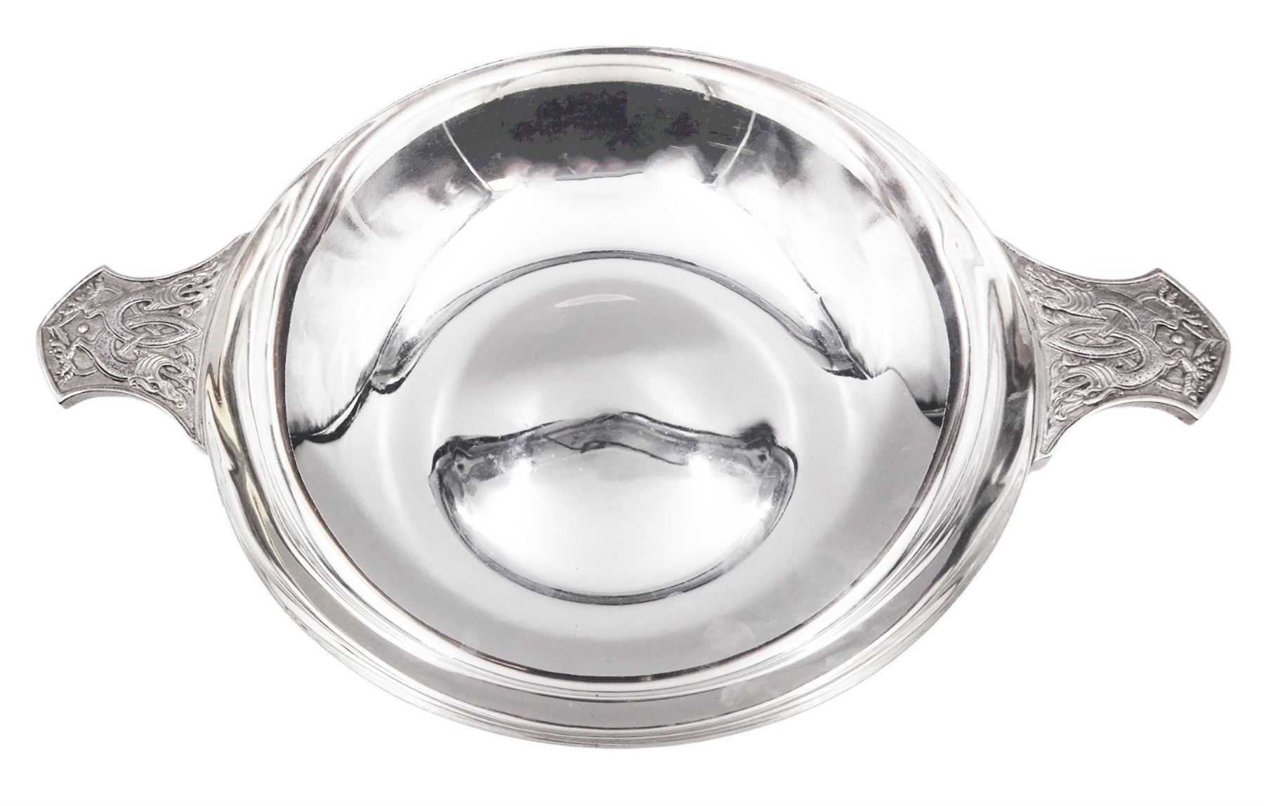 Large modern silver Quaich, of circular form with twin handles cast with stylised dragon motifs, hallmarked Birmingham 2009, makers mark W&W, D18cm, approximate weight 11.14 ozt (346.8 grams)