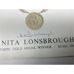 On the direct instructions of Anita Porter nee Lonsbrough Great British Olympic and Commonwealth Games gold medal winning swimmer - collection of early and international memorabilia comprising original Huddersfield Bath Club track suit top bearing eight stitched on cloth badges including British Empire & Commonwealth Games 1958 England Team, YSASA, North Eastern Counties ASA, ESSA Division 3,  English Schools Swimming Association winner etc
The swimming costume Anita wore at the 1958 Commonwealth Games in Cardiff, her first major championships, where she won two gold medals. The grey elastic on the sides, in those days, she would use to make it tighter and more streamlined.
Blue track suit from the 1960 Olympics which she wore on the podium receiving the gold medal.
1960 pool side towelling robe used at the Rome Olympics (interesting to note her name is spelt wrong on the embroidered label).
1962 Commonwealth Games pool side towelling robe used in Perth Australia when winning three Gold medals. 
It was also this year she became BBC Sports Personality of the year, the first female to do so.
Her 'lucky' pool side towel which she took with her to every event she competed in and which can be seen round her neck in many official celebratory photographs. Copies of some of these photographs are included for identification.
In addition there are two souvenir programmes of an evening event to honour Anita at The Theatre Royal Huddersfield and she has kindly signed the front cover on one of these.