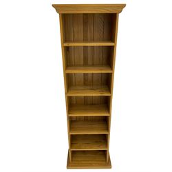 Small solid light oak open bookcase