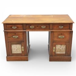 Late Victorian oak kneehole desk, rectangular top over three frieze drawers and two pedest...