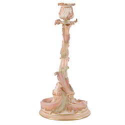 Royal Worcester pair of blush ivory candlesticks, modelled in the rococo style of scrolling foliate design upon a circular spreading base, gilt-heightened, puce mark to base and numbered RN160134 and 1478, H32cm