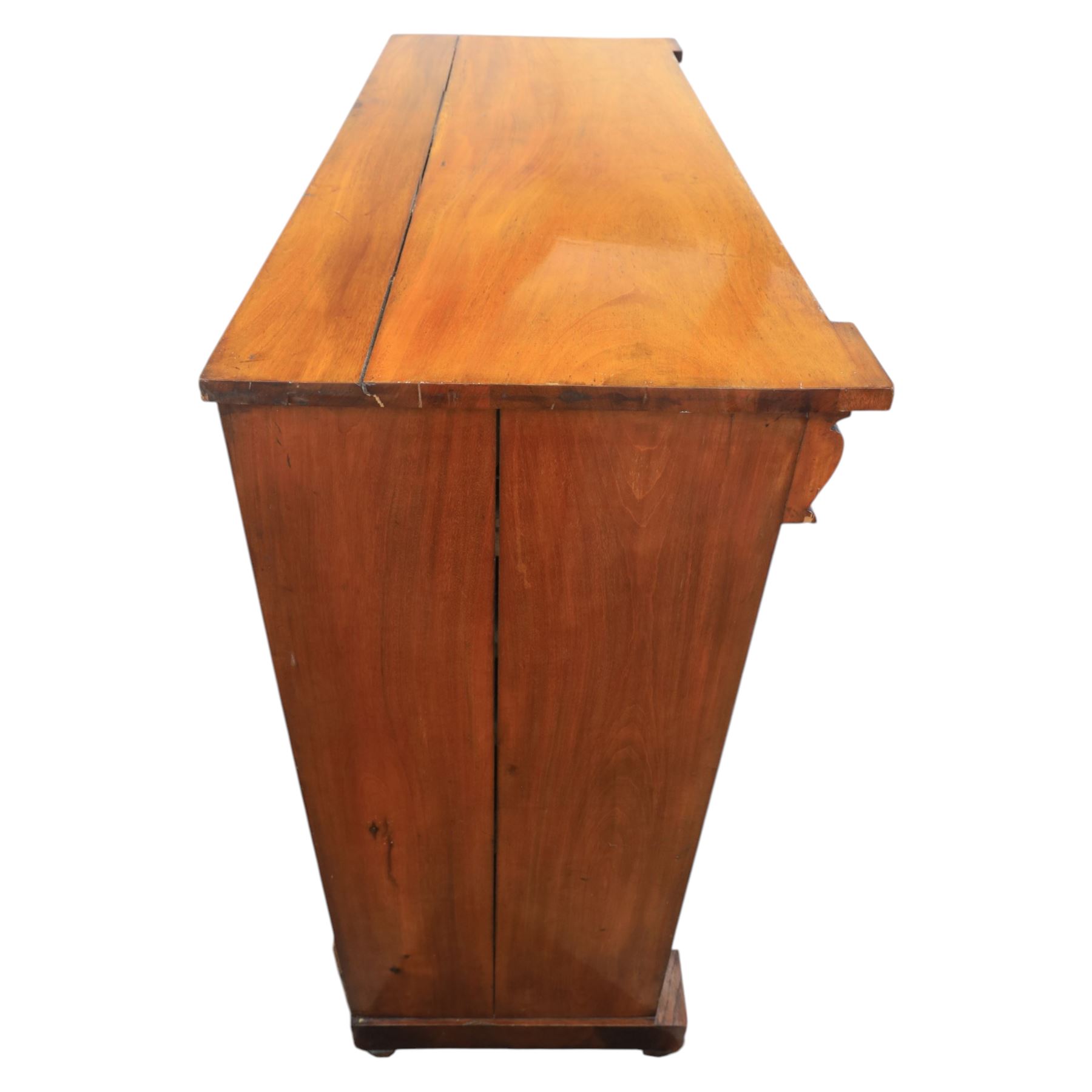 Victorian Scottish mahogany chest, cushion drawer over assorted small drawers and three long drawers, all with flame veneered fronts, turned wooden handles