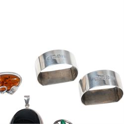 Two silver serviette rings, possibly by Warriss & Co, Sheffield 1982 and silver stone set jewellery including an amber set brooch/ pendant and pair of earrings, malachite brooch etc 