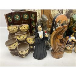 Franklin Mint House of Faberge 'The Nativity' ceramic egg, together with a Russian doll decorated with nativity scenes, Cinque Ports Pottery monk salt and pepper shaker and other monk figures, etc