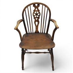 Late 19th century elm and ash low-back Windsor chair, swept arms raised on turned supports  united by H-stretcher