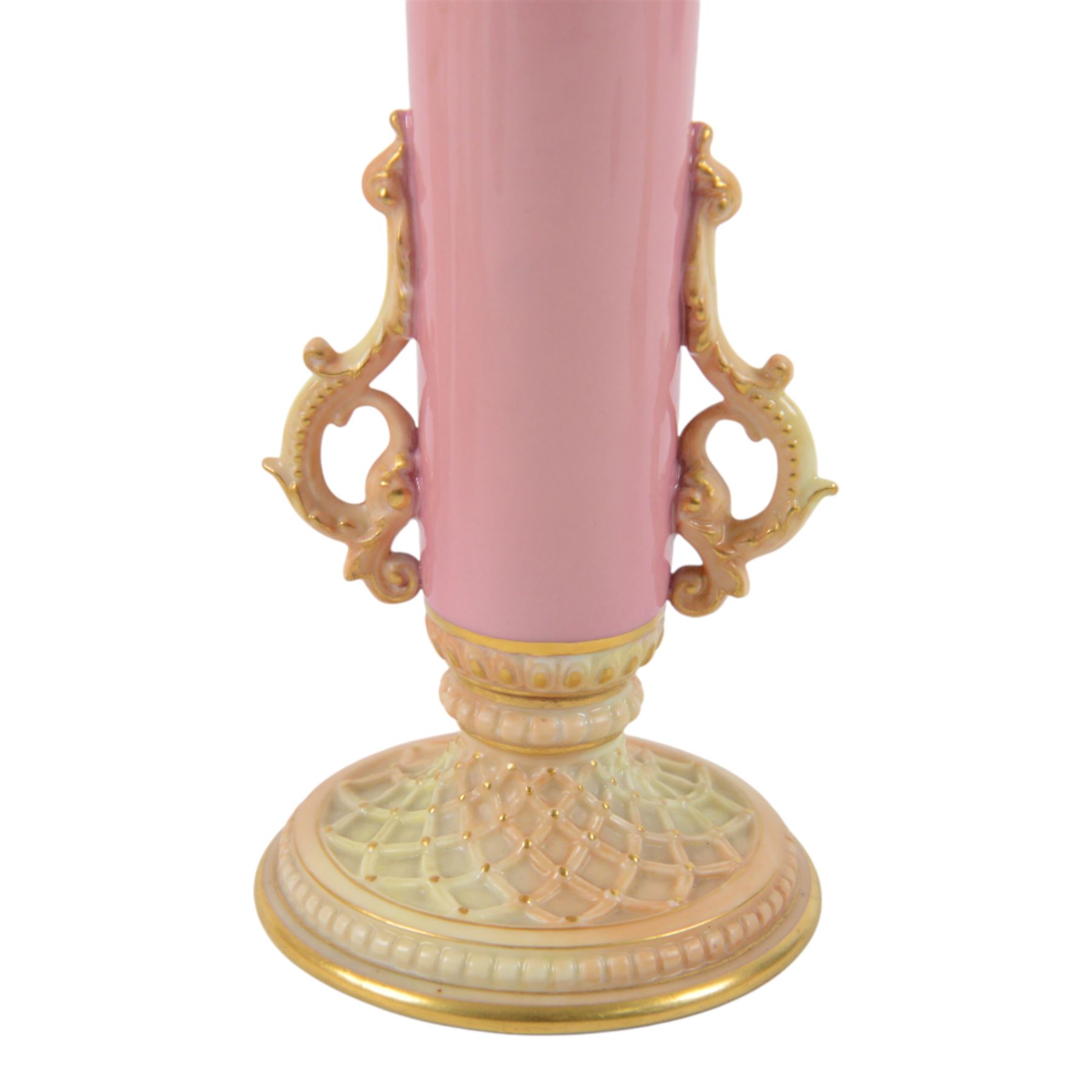 Royal Worcester Blush Ivory, comprising reticulated pot pourri jar upon eagle support, with black printed mark beneath, twin handled posy vase, shape no. 1556 with pink fluted body and puce mark beneath and three jugs, including shape no. 1018 example with bird mounted handle and two shape 1094 examples, all decorated with floral sprigs and with puce marks beneath, tallest H21cmn