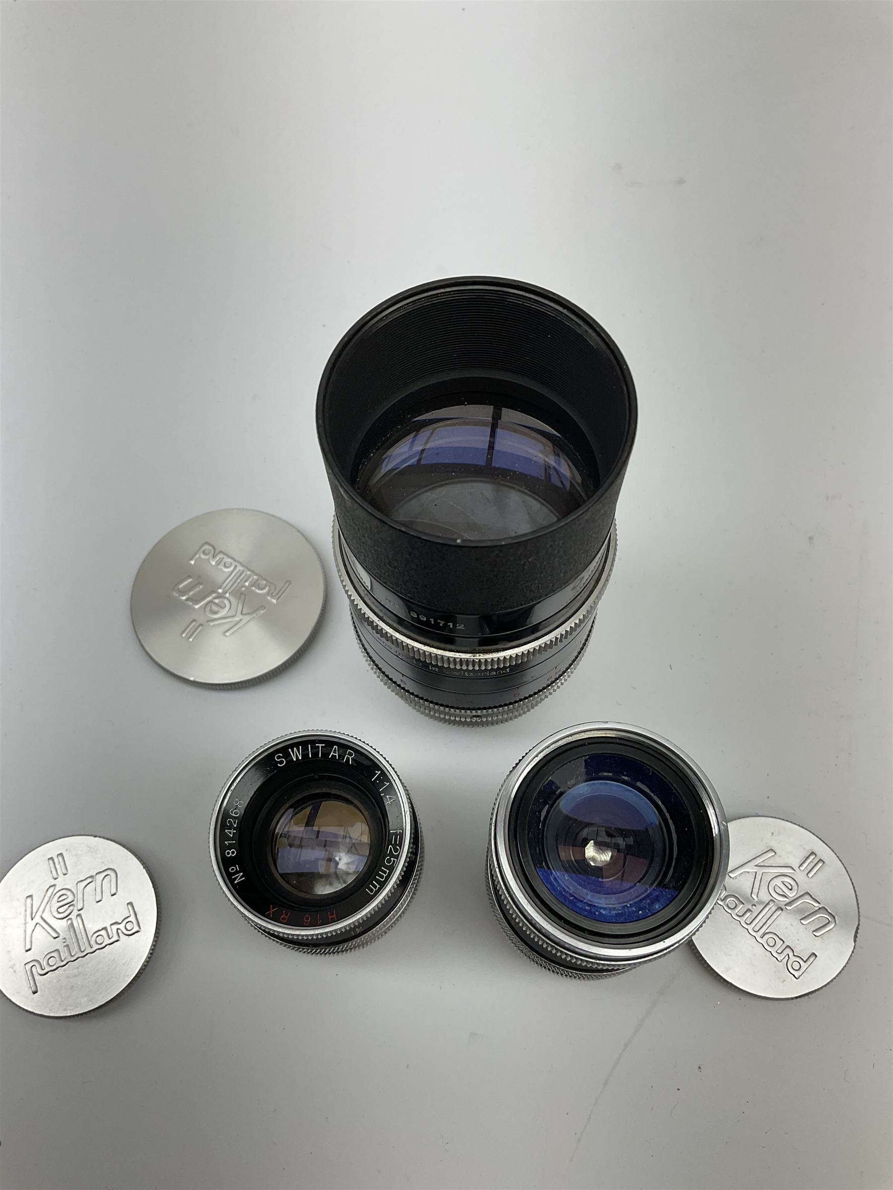 Paillard Bolex H16 Reflex 16mm cine camera with handgrip and turret for interchangeable lenses, KERN Vario-Switar 1:1,9 f=16-100mm POE BOLEX H16RX lens, KERN Switar 1:1,4 f=25mm H16 RX lens, KERN Switar 1:1,9 f=75mm lens, KERN Switar 1:1,6 f=10mm H16 RX lens