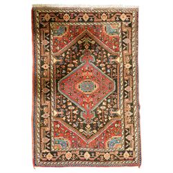 North West Persian Heriz hand-knotted rug, indigo and madder red field with a central angu...