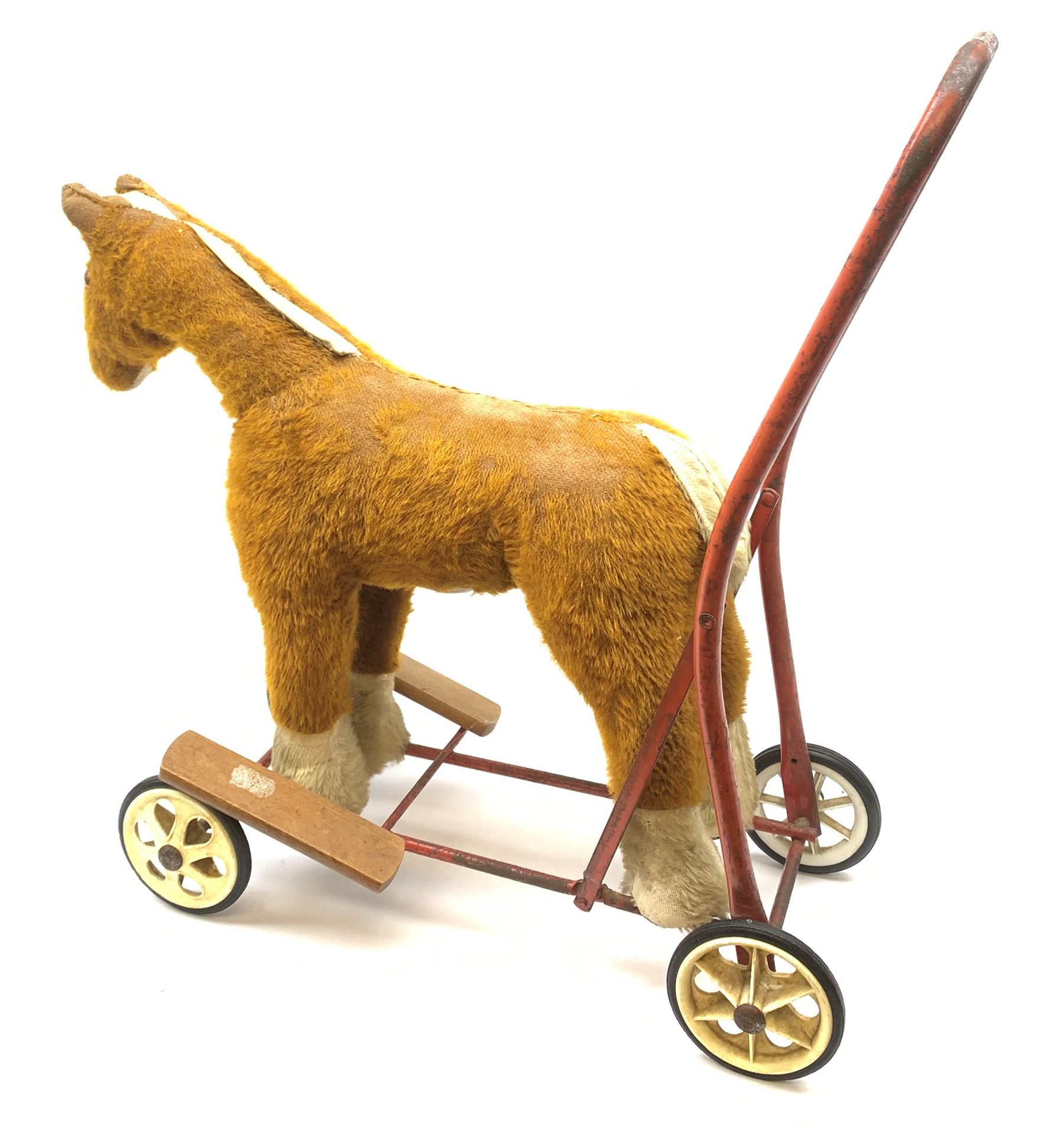 Pedigree push along plush covered horse 1950s-60s with red tubular metal framework and beech foot rests H25