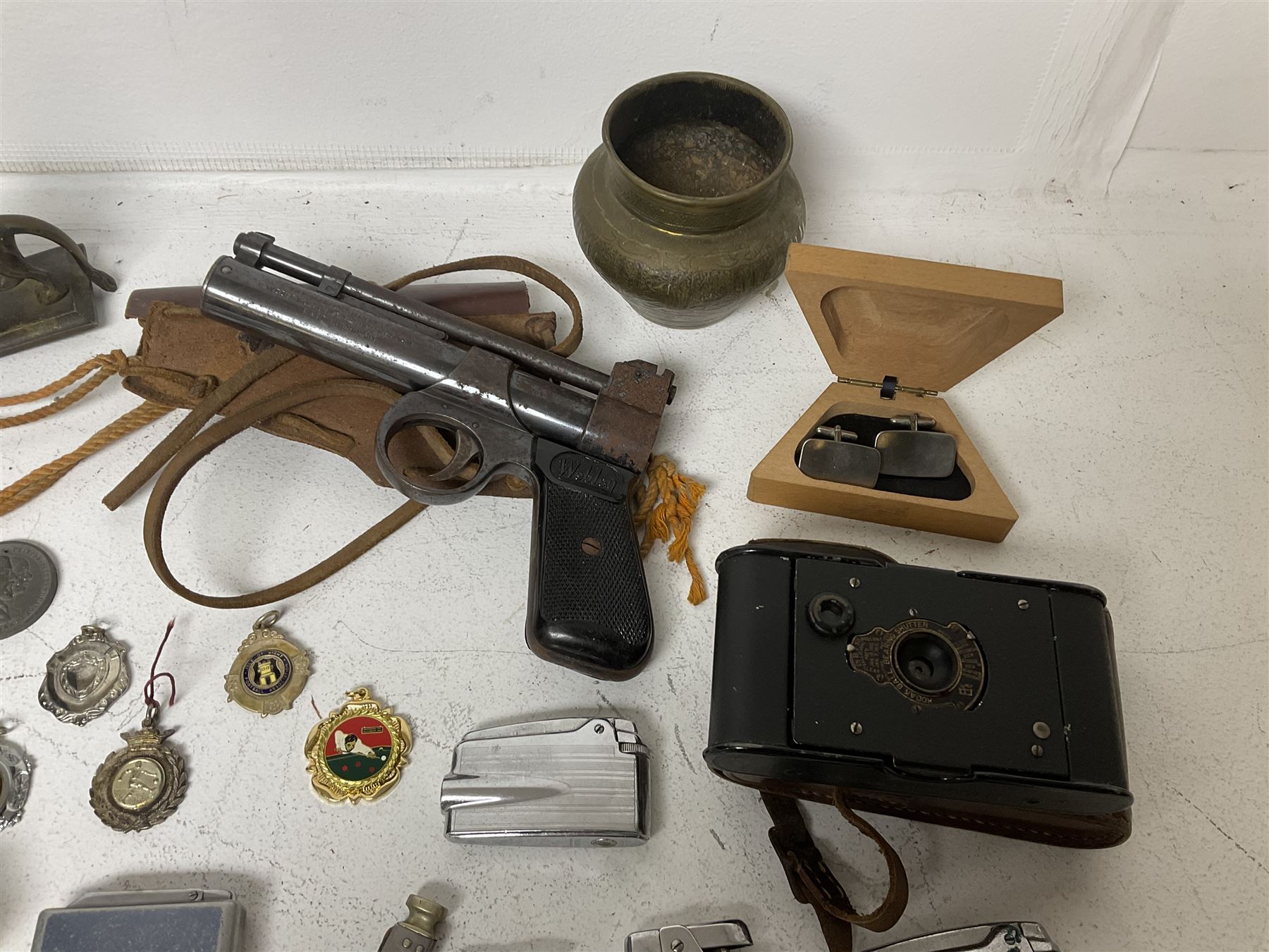 Webley junior air pistol, Kodak camera, collection of fob medals, lighters, etc