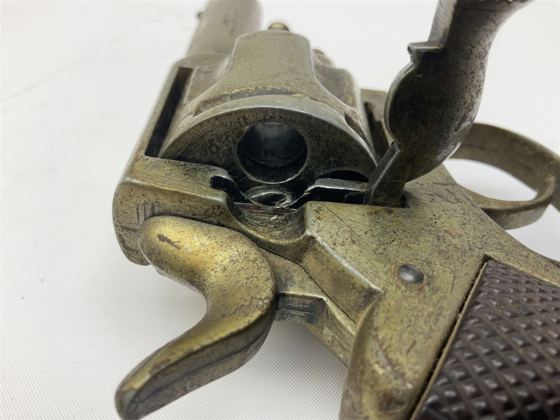 Early 20th century Flobert 5mm blank firing revolver with six-shot chamber, top venting, nickel plated with folding trigger No.118 L12.5cm overall; replica non-firing 'British Bulldog' revolver; and Windproof gas lighter inscribed 'Revolver-99 Spring and Autumn' in holster marked 'Star-Line'