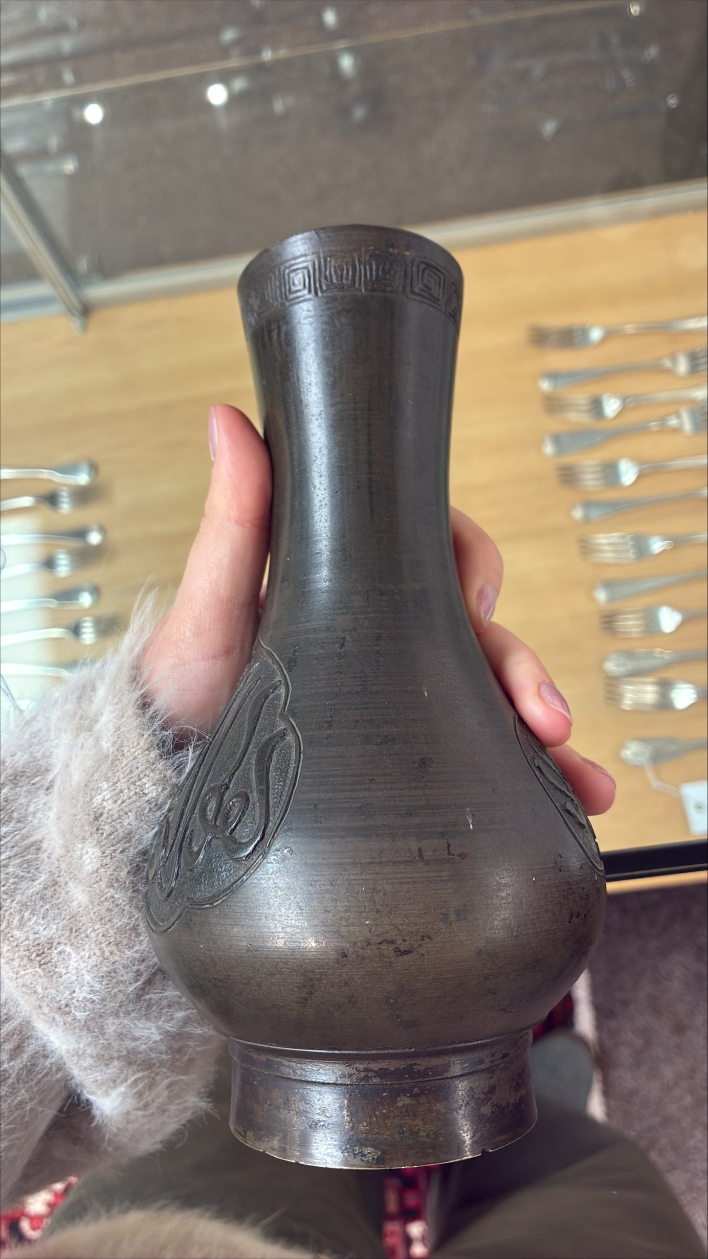 Chinese bronze vase, the cartouches containing Arabic characters on a granulated ground, unmarked H19cm