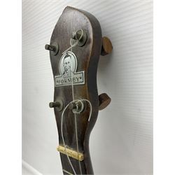 George Formby banjolele with metal plaque to headstock L55cm; in carrying case with instruction booklet.
