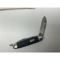 Seven pen knives, two lighters, including one Ronson example and a collection of postcards