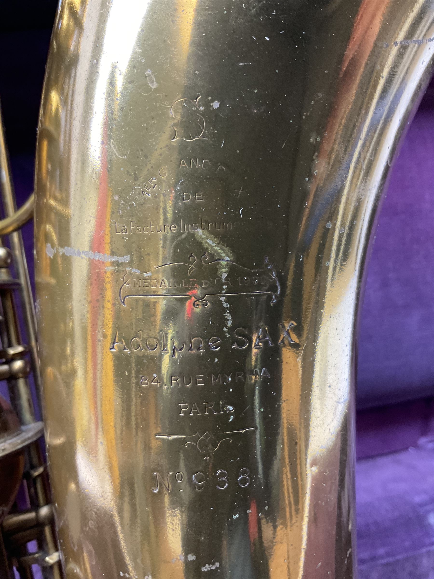 Brass tenor saxophone by Adolphe SAX, 84 Rue Myrha, Paris,  No.938 serial number 12097, H75cm excluding crook; in hard carrying case bearing plaque for Henri Selmer
