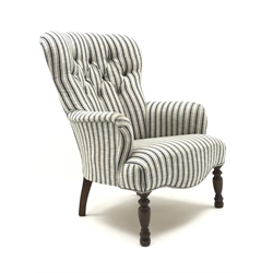  Small Victorian style armchair upholstered in deep buttoned stripe fabric, turned supports, W64cm  
