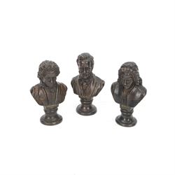 Three small bronze effect brass busts, modelled as composers Beethoven, Bach, and Wagner, each titled and raised upon a socle base, H14.5cm
