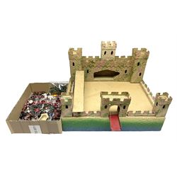 Sectional wooden fort on base with painted textured finish 46 x 36cm; together with over thirty lead and die-cast white metal soldiers and horses by various makers; and a small quantity of plastic figures of soldiers