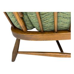 Ercol - mid-20th century three-piece suite, comprising two-seater sofa, upholstered in green fabric with teak frame, on splayed supports with stretcher (W142cm, D95cm, H87cm); with matching pair of armchairs (W82cm, D95cm, H87cm)