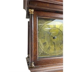 John Fletcher of Barnsley - Mid18th century 30-hour oak cased longcase clock, with a flat pediment and broad cornice, square hood door with attached pillars and gesso capitals, long trunk and conforming door with a break arch top, square plinth on a shaped base, brass dial with cast spandrels and engraved dial centre, chapter ring with Roman numerals and five minute Arabic’s, engraved calendar dial and steel hands, chain driven count wheel movement striking the hours on a bell. With pendulum and weight. The Fletcher family were a prolific family of clockmakers working in Barnsley (Yorks) during the 18th and early 19th century.