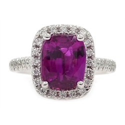  18ct white gold ruby and diamond halo cluster ring, ruby appox 3 carat, hallmarked 18ct  