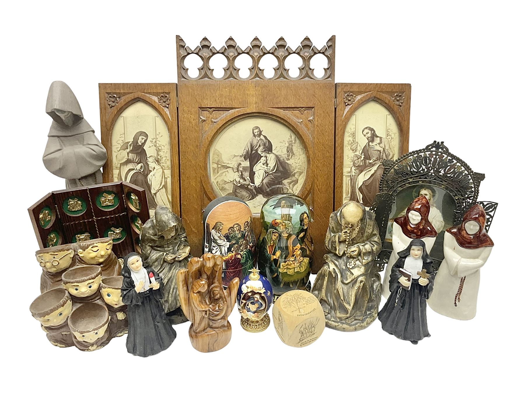 Franklin Mint House of Faberge 'The Nativity' ceramic egg, together with a Russian doll decorated with nativity scenes, Cinque Ports Pottery monk salt and pepper shaker and other monk figures, etc