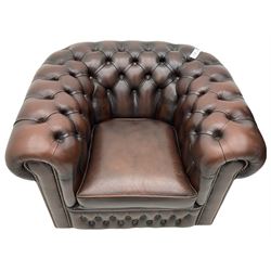 Chesterfield armchair, upholstered in brown buttoned leather