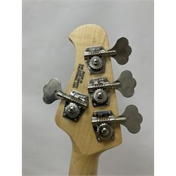 Ernie Ball Music Man Sting Ray 4 string bass guitar, in natural finish with roasted maple neck and tortoiseshell effect scratch guard, serial no 87485, in black Music Man hard case, guitar L114cm