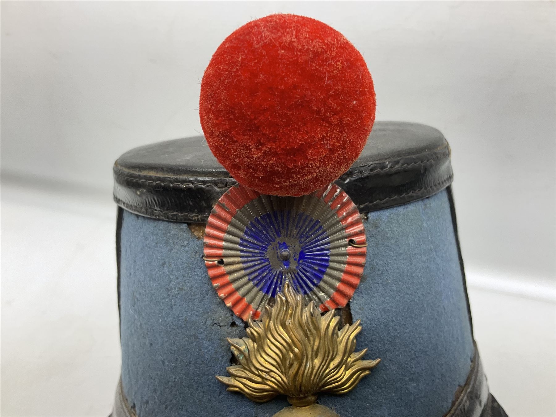 WW1 French Ecole Speciale Militaire Saint-Cyr shako with metallic tricolor cockade and scarlet pompom c1914