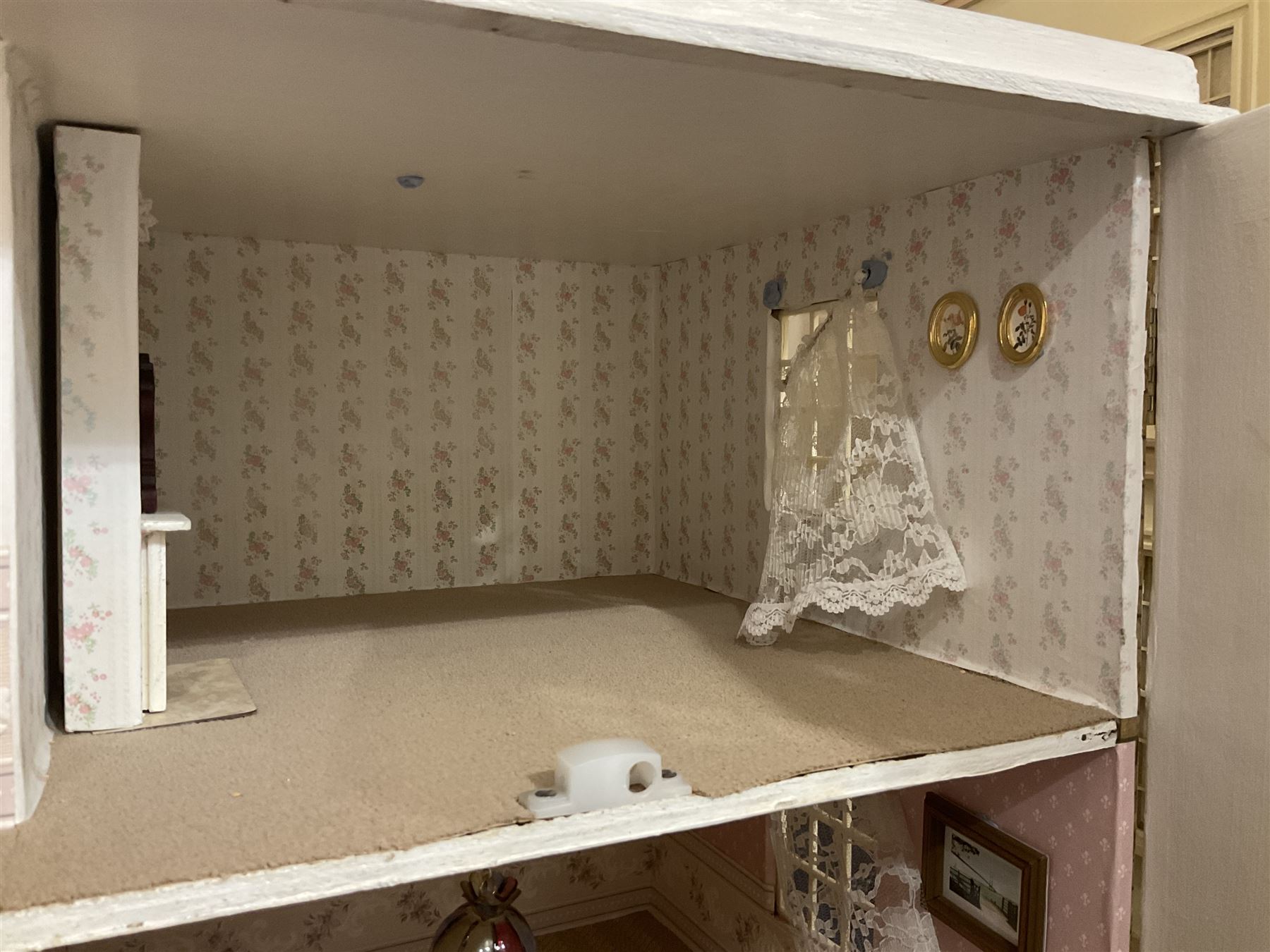 Modern scratch-built Palladian style wooden dolls  house as a 19th century double fronted two-storey property with simulated brick and stone walls under a removable simulated slate hipped roof; the triple hinged front elevation opening to reveal six rooms with central hall, stairs and landing L94cm H56cm D40cm