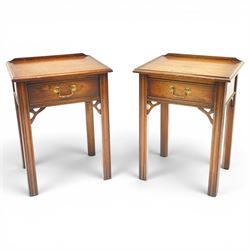 Pair of mahogany bedside tables, with quarter galleried top, single drawer with brass swan...