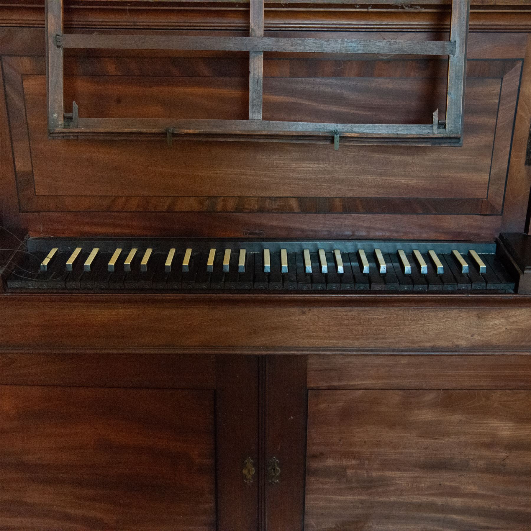 Mid-18th century Johannes Schnetzler (John Snetzler) Chamber Organ 1742
Single manual chamber organ, five octave keyboard with 58 keys GG-f3, A=427, with ebonised naturals and ivory faced sharps. With six speaking stops, Open Diapason, Twelfth, Cornet, Stopped Diapason, Flute and Fifteenth. Crank foot operated single rise reservoir. Case with alterations from the early part of the 19th century including the “gothic” arches and rectangular watered silk panels. Some of the pipework has been replaced, all the pipework is however present and the organ plays, however the pipe work is dirty and in need of attention, the action and stop work is also in need of some repair, adjustment and regulation. Thought to be the oldest Schnetzler chamber organ in Great Britain and is referred to in some sources as possibly owned by Handel who lived in London when Schnetzler worked there. However there is no documentary evidence to confirm this. Full notes and technical details regarding the background, restoration and history of this instrument can be found in The Harley Foundation Historical and Technical Report No 29 (2005) by Edward Bennett and Martin Goetze. This report can be downloaded 
HERE.

Given the intricate nature of these historic instruments, specialist support will be available if required – including a professional organ builder prepared to undertake full dismantling and reassembly – to assist successful buyers with safe removal and onward handling. Price upon application. 

This item has been registered for sale under section 10 of the APHA Ivory Act Reference GXAQ2W4S




