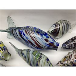 Collection of mid 20th century murano style glass fish, each with multi coloured inclusions largest L42cm
