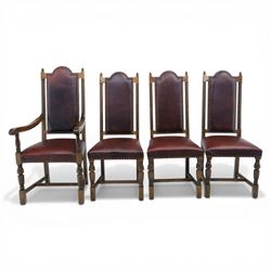 Carolean revival oak dining table and eight chairs (7+1), refectory table with rectangular boarded top and cleated ends, raised on shaped trestle end supports with central stretcher, accompanied by eight high-back chairs including a carver, leather upholstered panels and seats with studwork, on turned legs with stretchers.