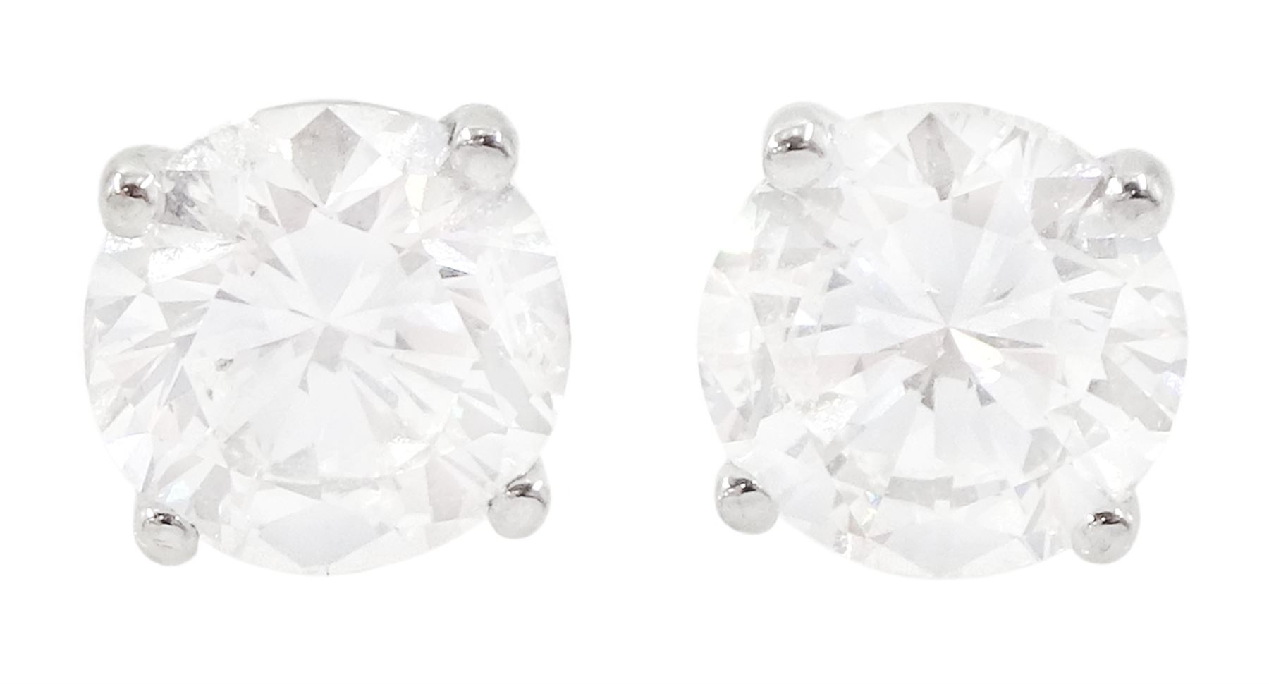 Pair of 18ct white gold round brilliant cut diamond stud earrings, stamped, total diamond weight 2.01 carat, with World Gemological Institute report
